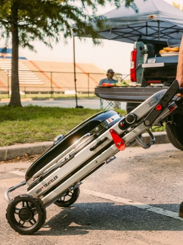 Weber Portable Taveleer Grgill collapsed showcasing its convenient portability for tailgating