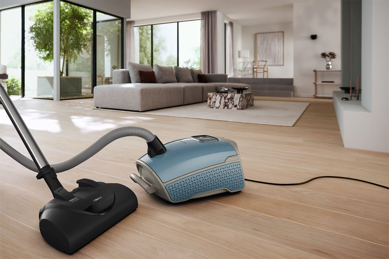 Front View of Miele Cannister Vacuum in Living Room