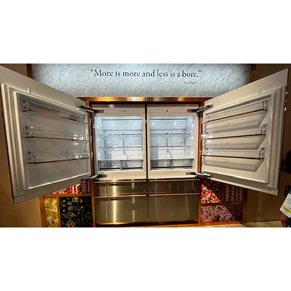A Cafe French door refrigerator with the doors open at KBIS 2024