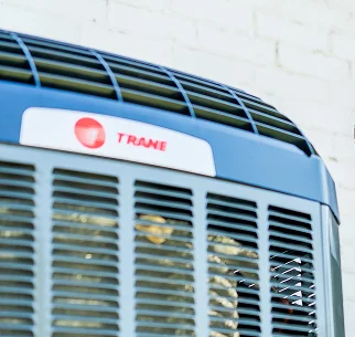 Technician repairing a home HVAC unit