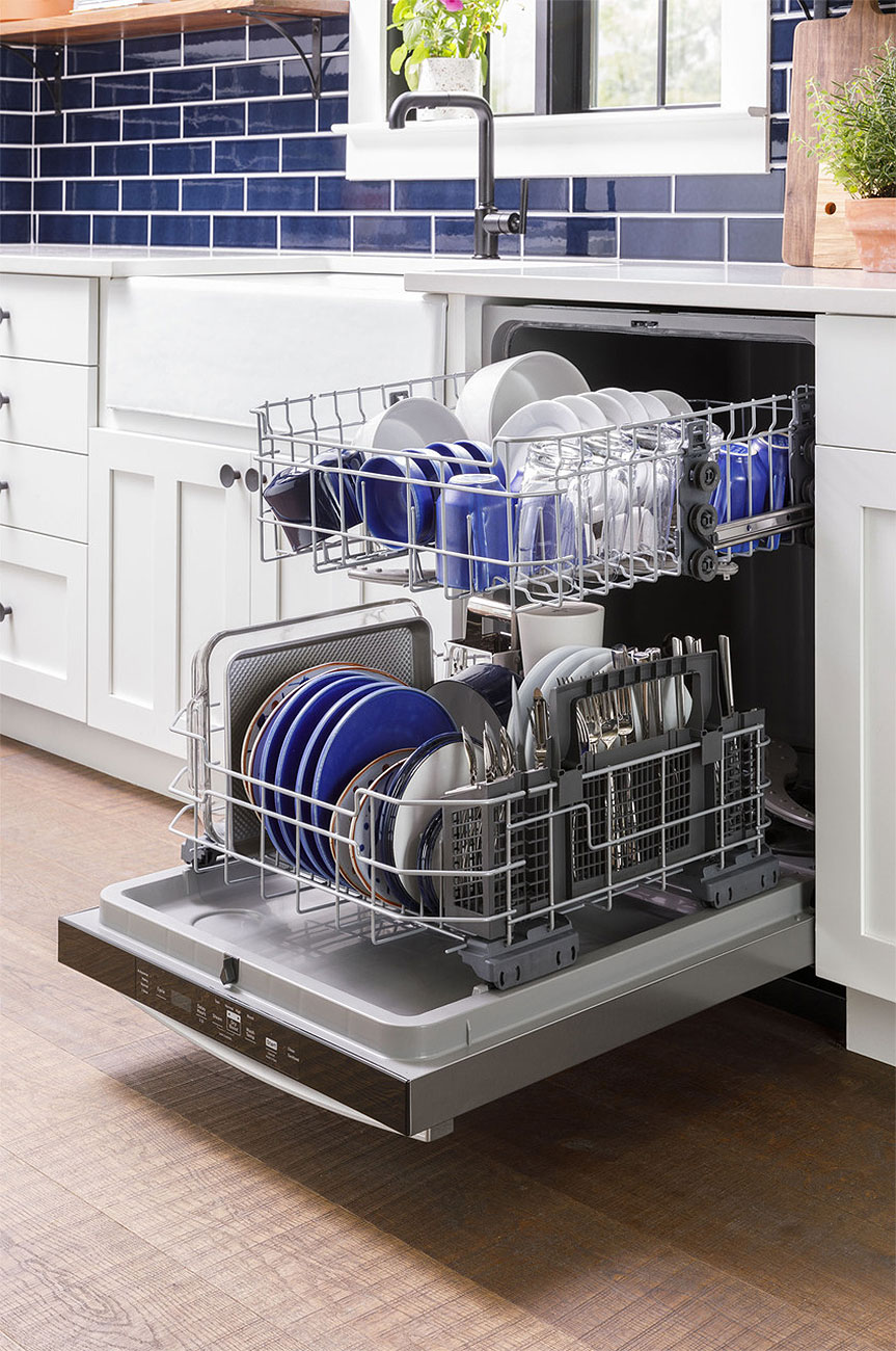 Stainless Steel GE Dishwasher With Full Racks in a Blue and White Kitchen