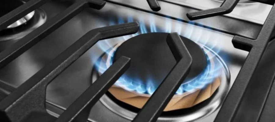 a close-up shot of one of the flaming burners and the continuous grates