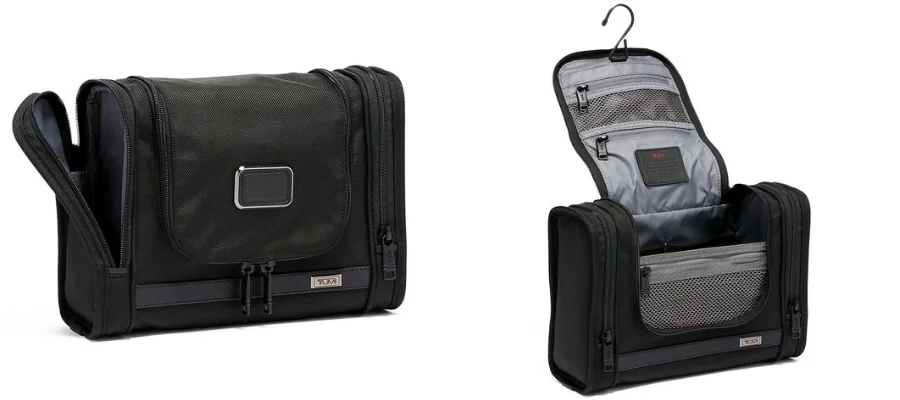 The TUMI Alpha 3 hanging travel kit from the front and opened up to show its storage
