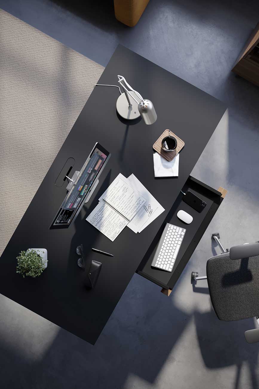 Top view of bdi natural walnut lift desk in office