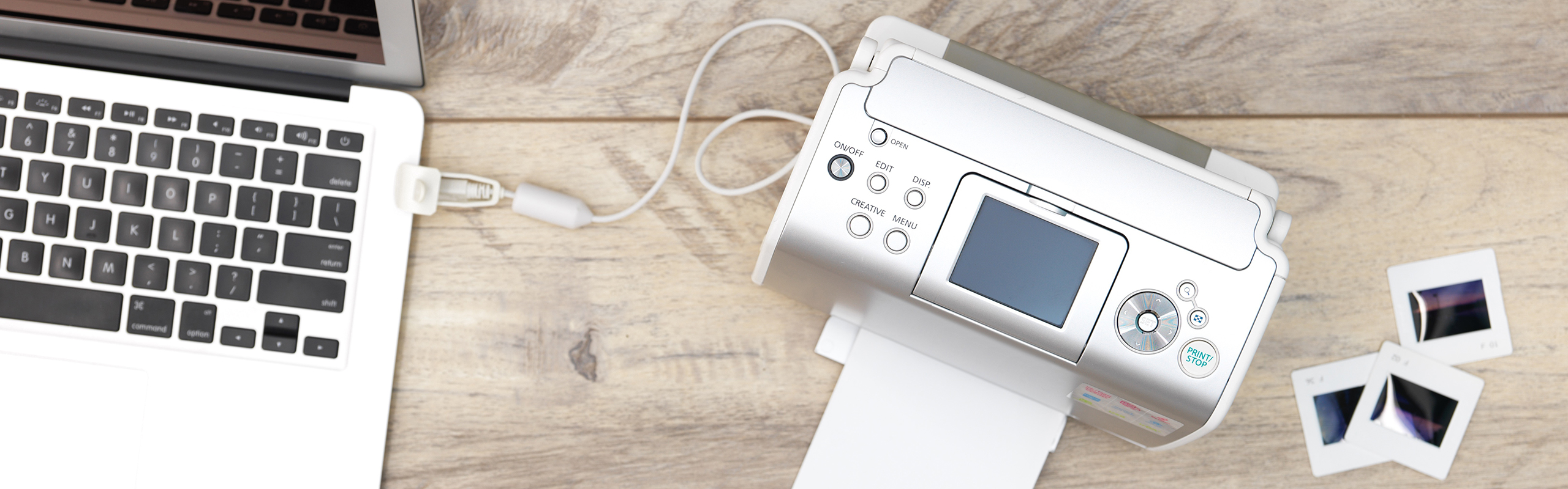 White printer connected to macbook