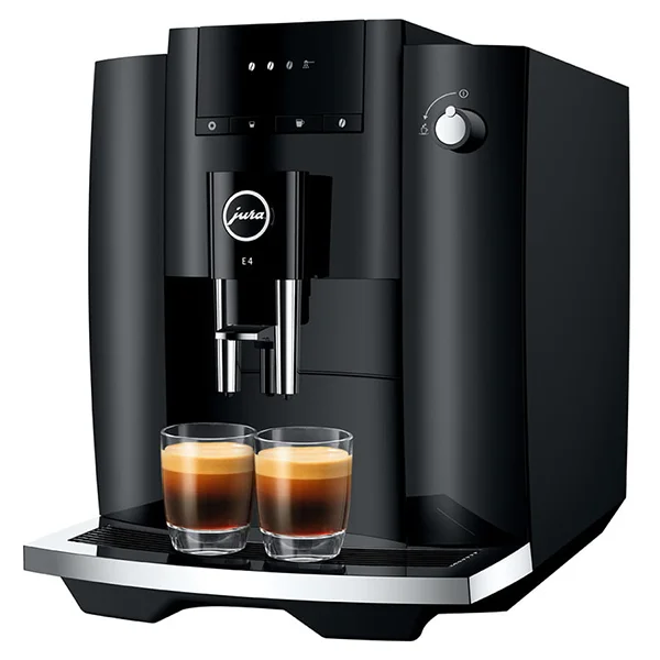 A black Jura E4 coffee machine with two shots of espresso sitting on the tray