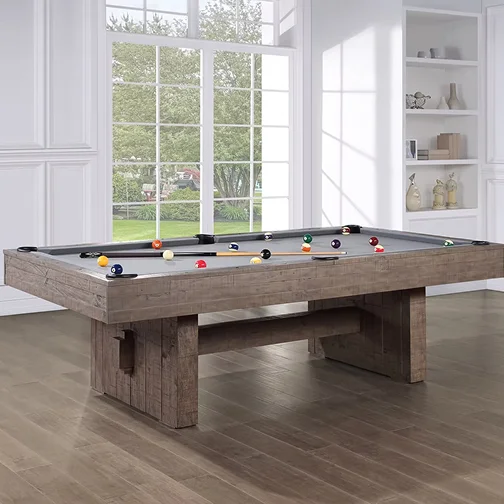 A sleek modern pool table located in a room with polished wooden flooring