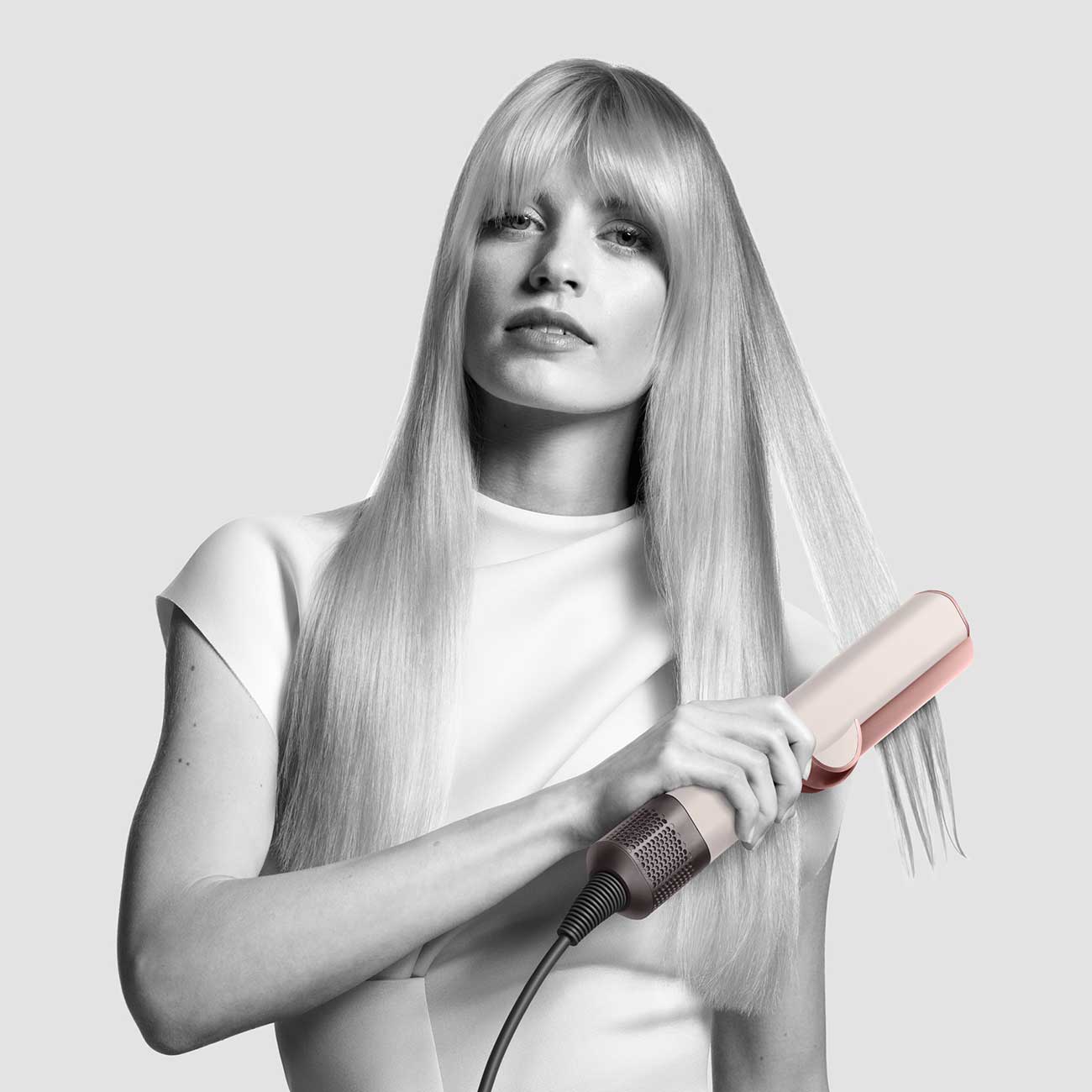 Airstrait Hair Straightener In-Use with Model 2