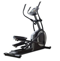 Angle view of a grey front-drive elliptical machine with a cup holder beneath the display console