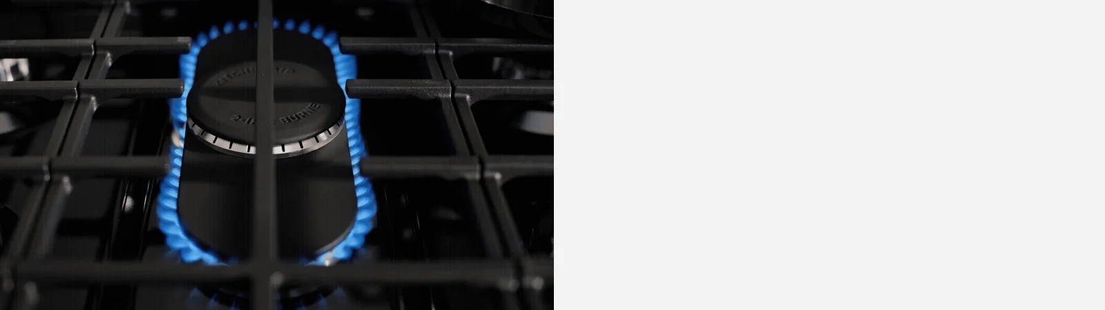 stylized background with black material showcasing what black ore would be with a 3 piece appliance suite in black ore from kitchenaid