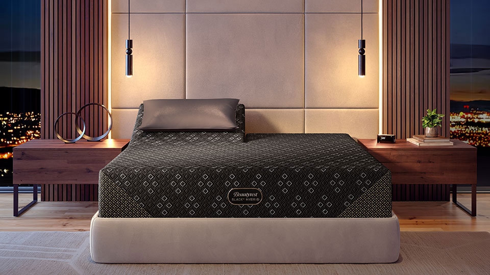 Person Sitting on Beautyrest Mattress