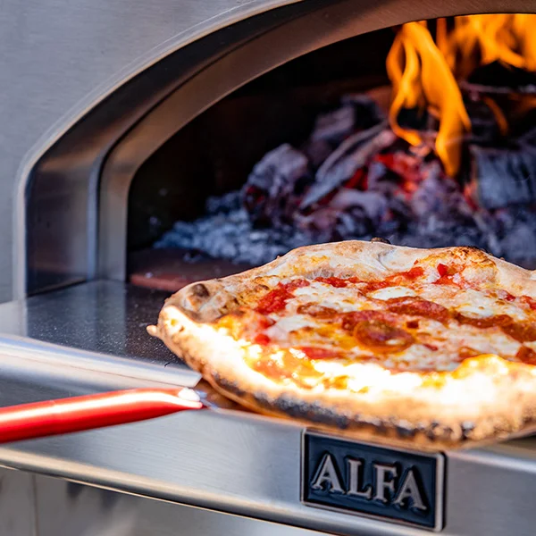 pizza peel removing pizza from Alfa pizza oven