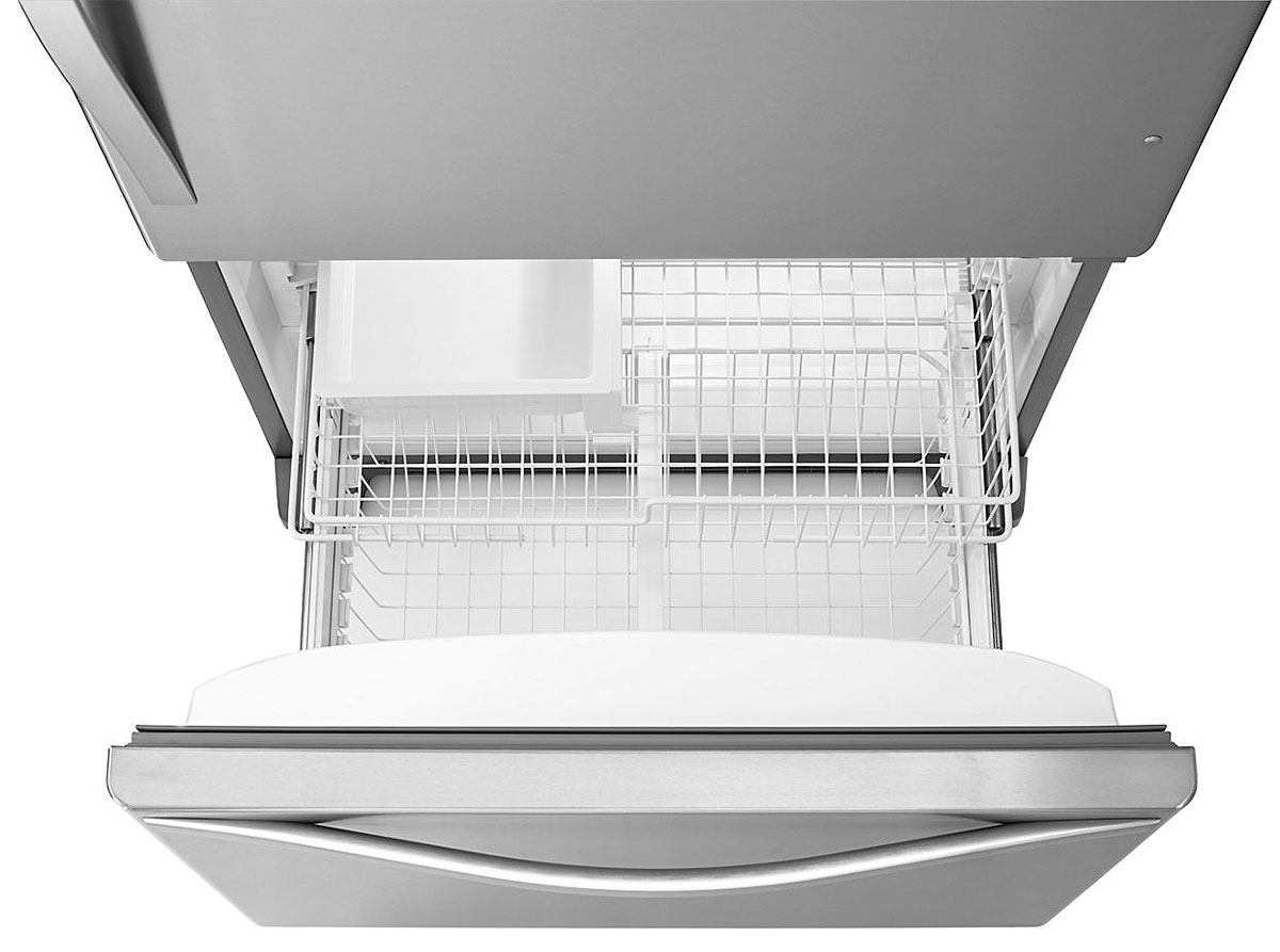 Top view of bottom freezer drawer open and empty inside