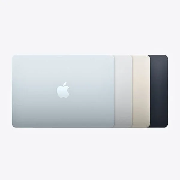 MacBook Air laptops in Sky Blue, Silver, Starlight and Midnight fanned out.