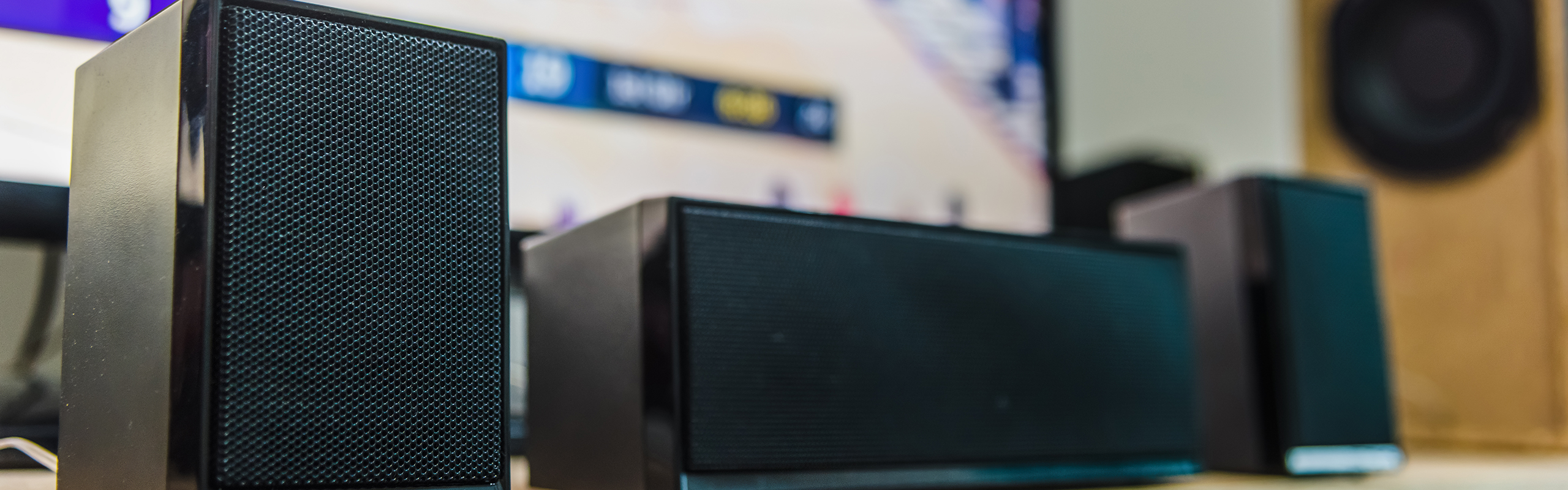 Three black speakers side by side