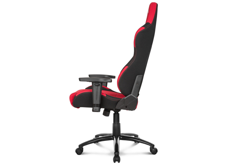 Side view of AKRACING gaming chair with armrests, tall back, and red seat cushion.