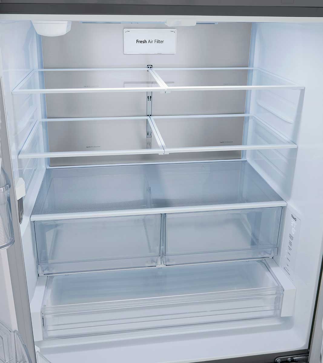 Close-up of empty shelves.