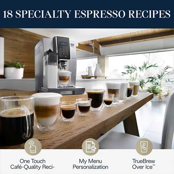 A silver colored espresso machine sitting on a wooden table with various coffee beverages for Mother's Day