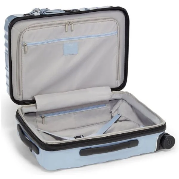 A photo of the TUMI 19 degree carry on in Halogen Blue opened up, with a view of the zipped up pocket.