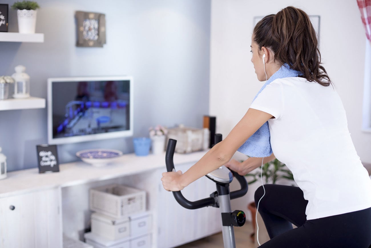 Woman on stationary bike