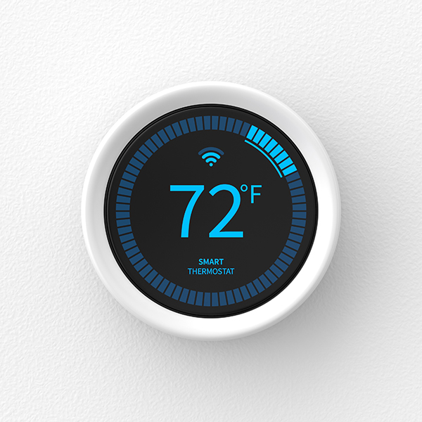 A round white smart thermostat with a black display and blue graphics reading 72 degrees