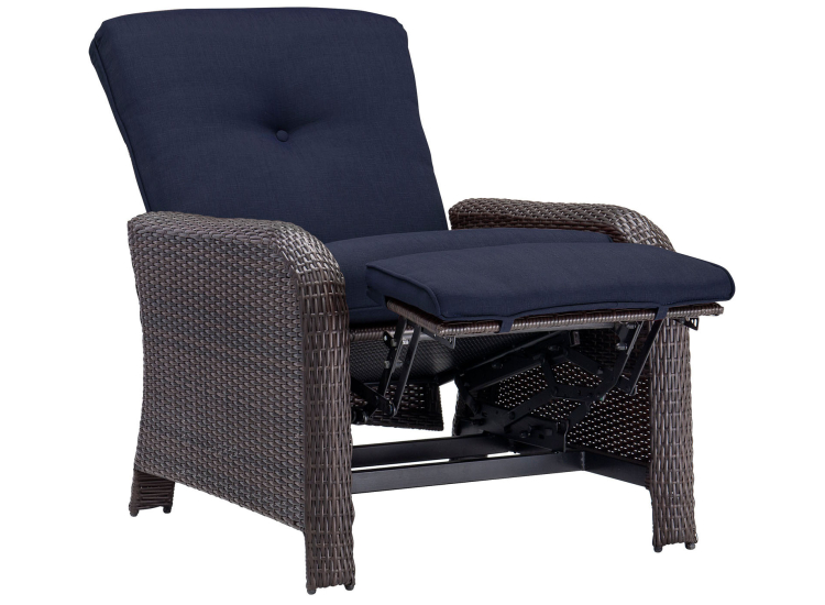 A navy blue reclining chair with wicker frame