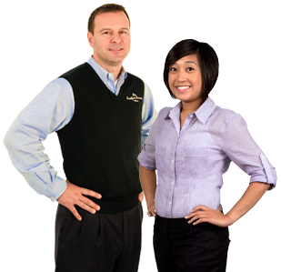Two Abt customer service professionals standing