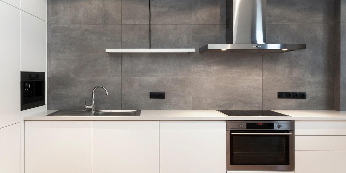 Stainless Steel induction range with stainless steel wall hood above