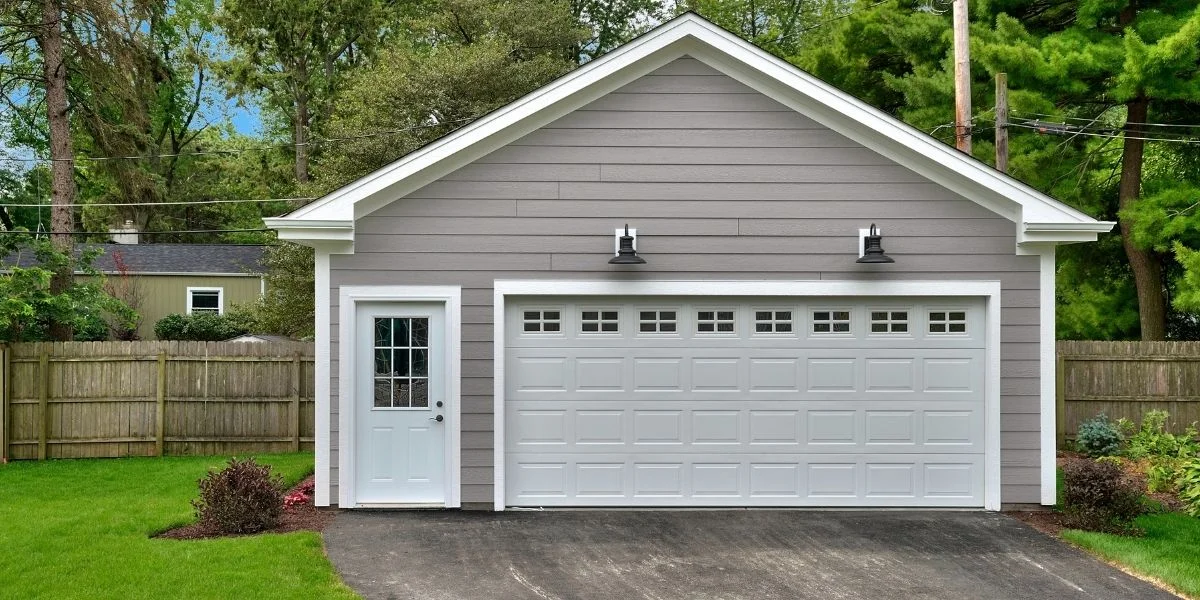 A beige detached two-and-a-half car garage