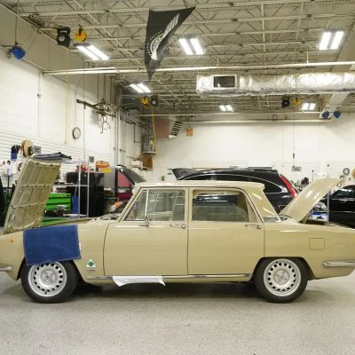 Tan retro vehicle in vehicle bay