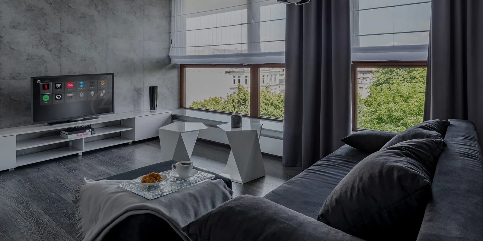 Motorized window shades in a bright home interior