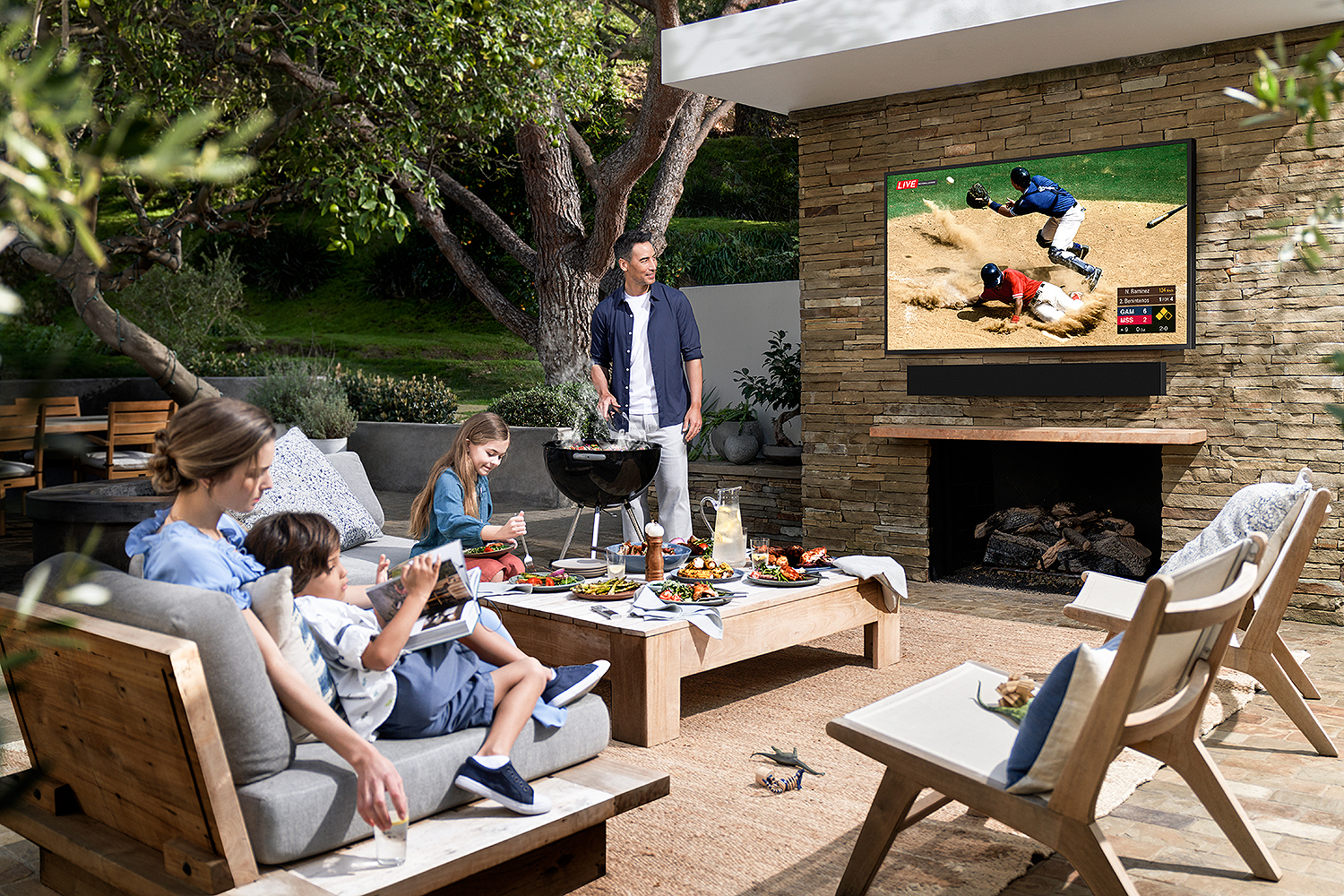 Lifestyle image of Samsung The Terrace Black QLED 4K UHD Outdoor Smart HDTV