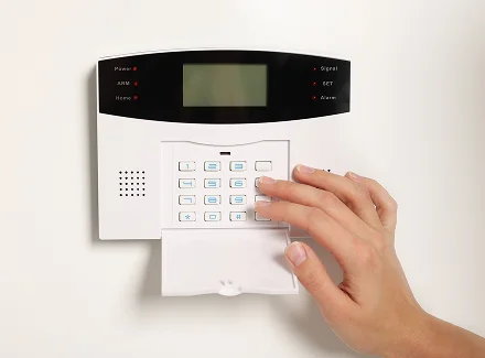 A homeowner setting up a residential security camera