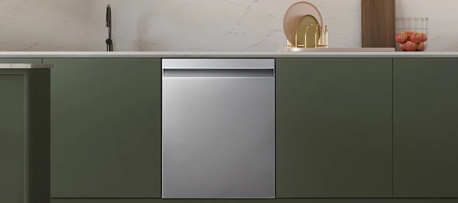 A stainless steel Samsung dishwasher installed in a kitchen with green cabinetry