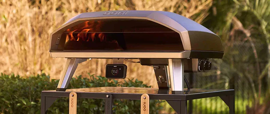 An Ooni Koda 2 pizza oven fired up to cook outside