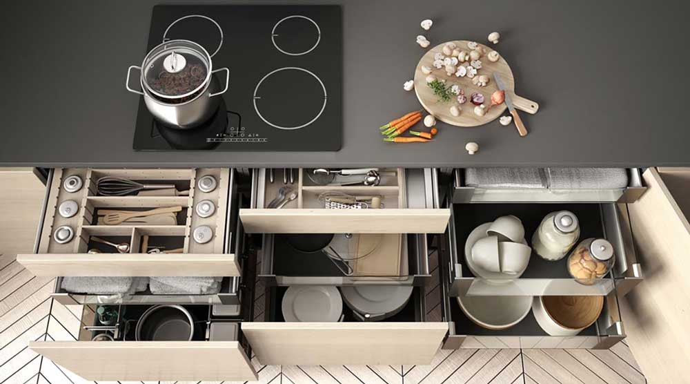 Open kitchen drawers under a range top
