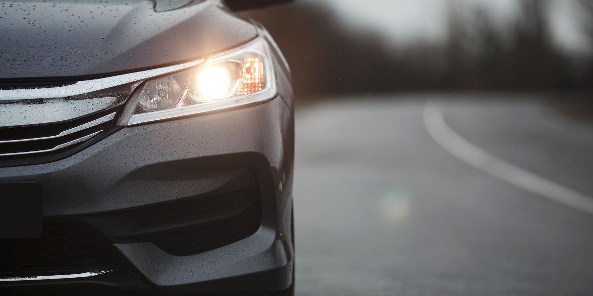 Black car with halogen headlights