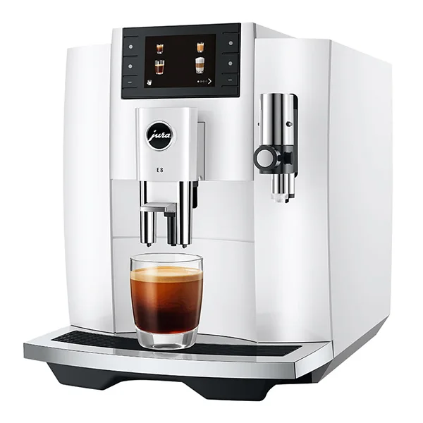 A white Jura E8 coffee machine with a shot of espresso sitting on the tray