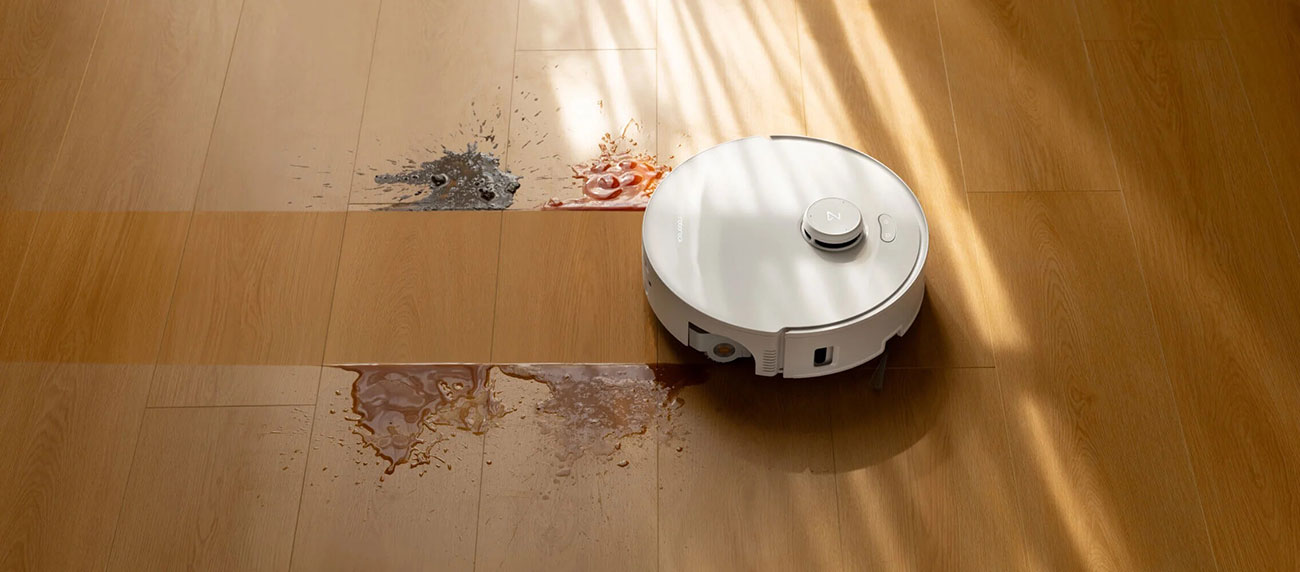 View of Roborock Robot Vacuum cleaning and mopping mess