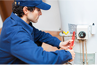 Person fixing water header
