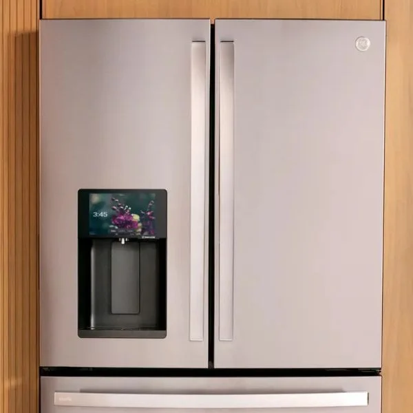 Front view of the GE Profile stainless steel smart refrigerator with Kitchen Assistant hub on the left door.