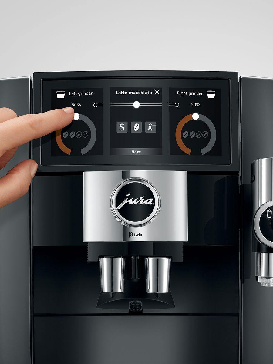 Person Using Coffee and Espresso Machine