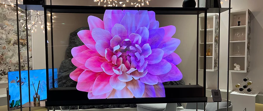 The LG OLED T transparent TV at CES 2025 displaying a pink flower