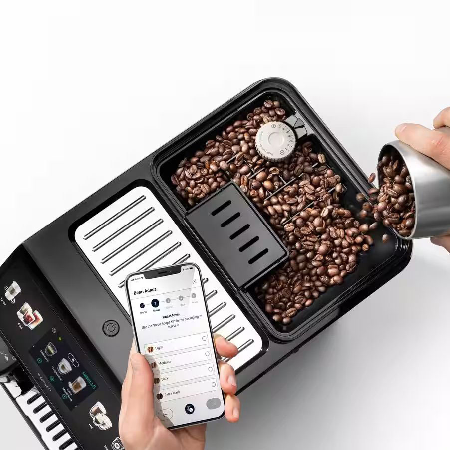 Person Using DeLonghi Espresso Machine Grinder