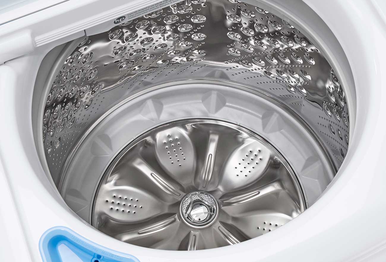 LG 5 Cu. Ft. Top Load Washer WT7150CW Showing Empty Stainless Steel Wash Drum
