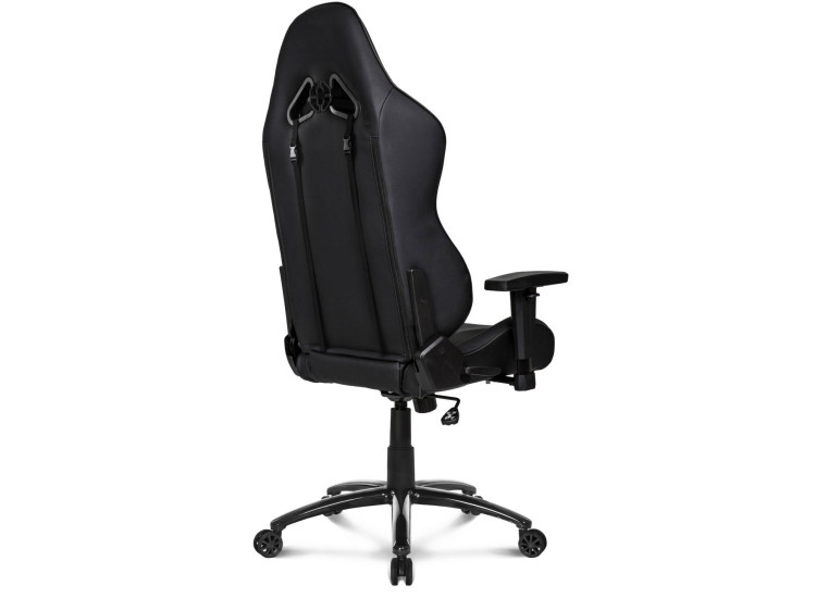 Close-up of AKRACING branded neck pillow on chair back