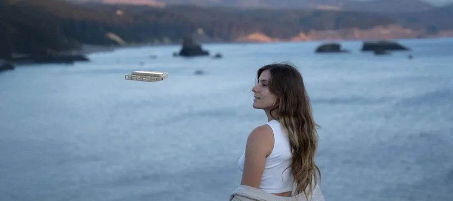 The HoverAir floating around a woman outdoors