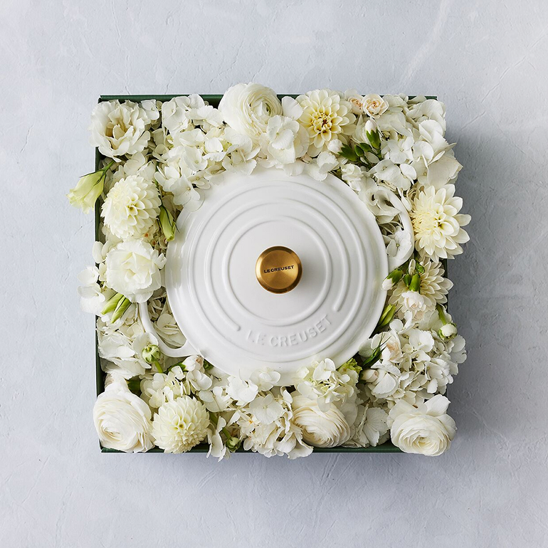 Dutch oven surrounded by flowers