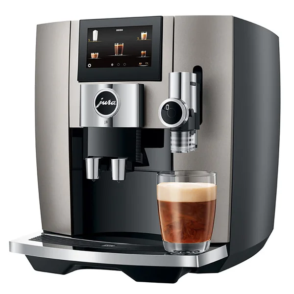 A silver/gray Jura J8 coffee machine with a shot of espresso sitting on the tray