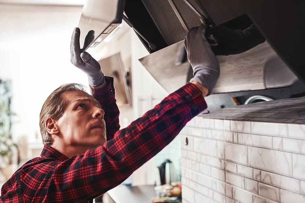 Person looking at range hood